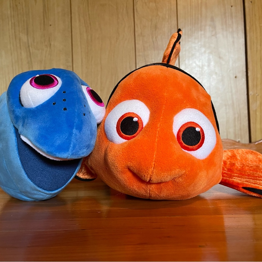 Selling together. Disney Pixar Nemo and Dory plush toys
